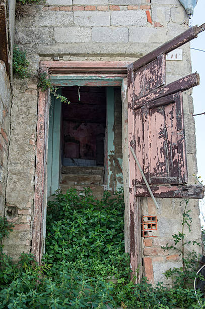 istock old entrace in one old house destroyed after earthquake 623345544