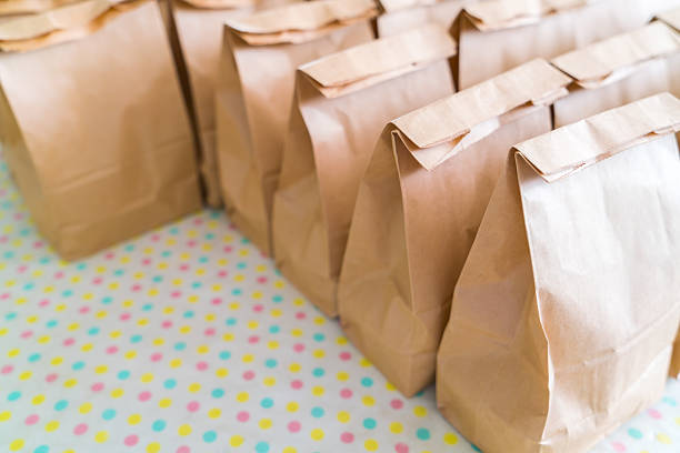 istock Rows of brown paper bags 623347460