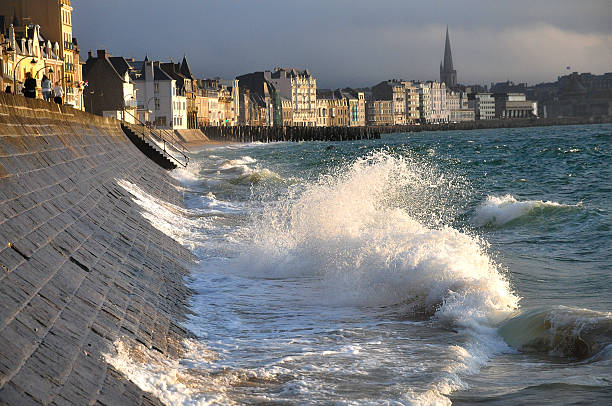 St Malo city walls Waves St Malo France  high tide stock pictures, royalty-free photos & images