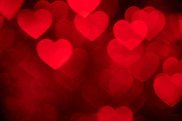 istock light red heart bokeh background photo, abstract holiday backdrop 623348226
