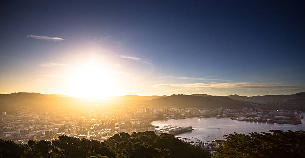 istock Sun Hitting the Horizon Over Wellington Harbour 623350240
