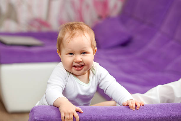 istock Happy kid is on the couch 623351160