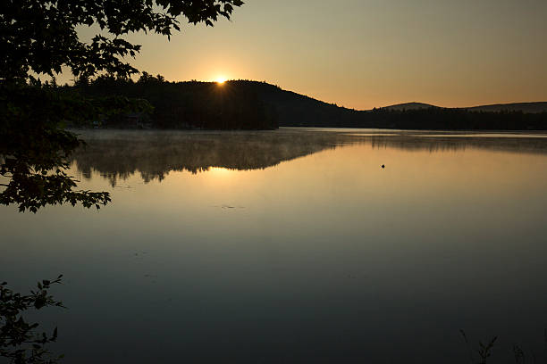 istock Sunrise on Mountain View Lake, Sunapee, New Hampshire. 623351306