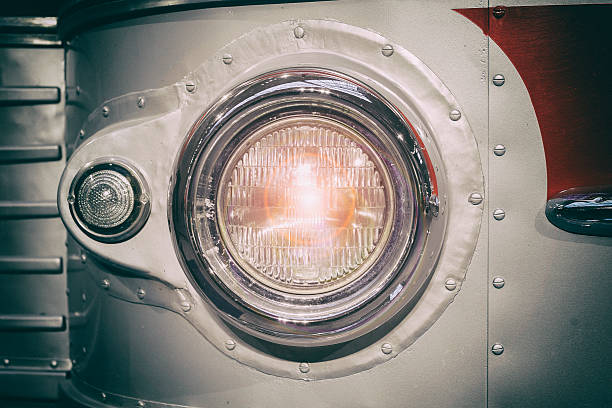 istock Part of retro style bus. Headlamp. Toned. Selective focus. 623352378