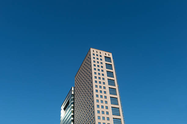 istock Office building in the city under blue sky 623353182