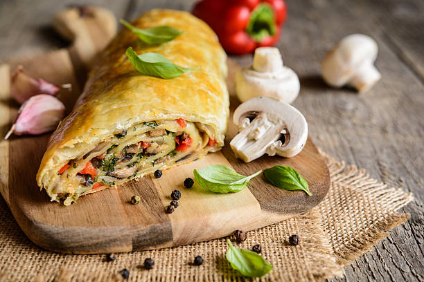 Vegetable savory strudel stuffed with mushrooms, red pepper, onion, garlic and parsley