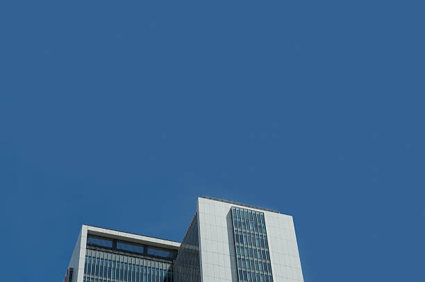 istock Office building in the city under blue sky 623354116