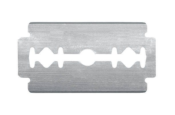 razor blade Old razor blade isolated on white background blade stock pictures, royalty-free photos & images