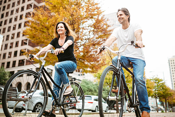 istock Mature Couple on Bikes in Austin Texas 623355444