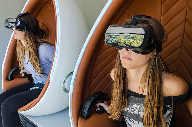Happy family! Mother and her daughter using virtual reality glas