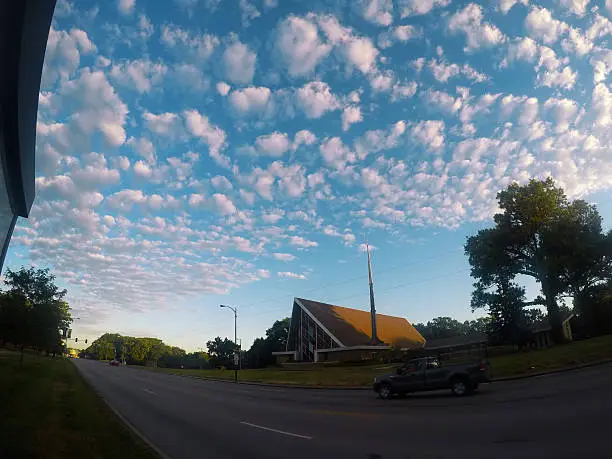 Photo of Blue sky with clouds and road on the rural side.