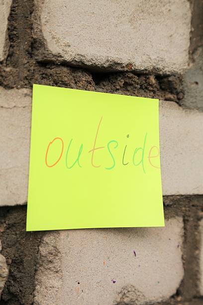 istock message outside o a yellow sticker 623358296