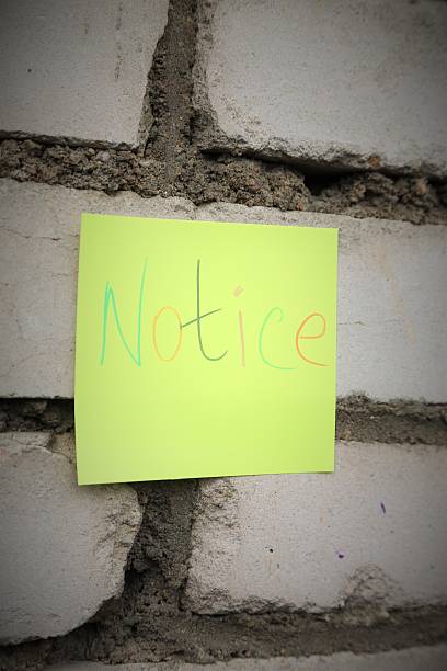 istock word notice on the yellow sticker 623358800