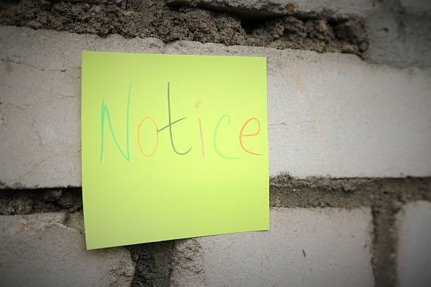 istock word notice on the yellow sticker 623358826