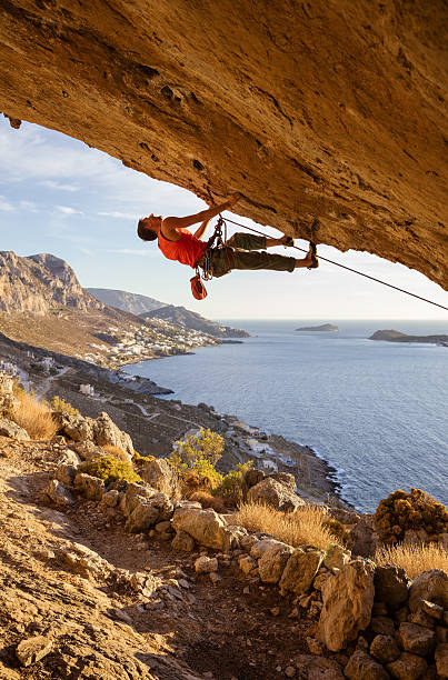istock Male climber on overhanging cliff 623361778