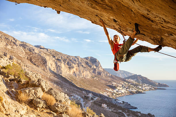 istock Male climber on overhanging cliff 623361970