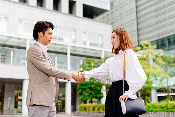 istock Handshake after successful deal in Japan 623363032