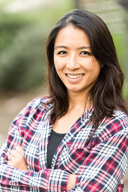 istock Smiling asian woman looking at the camera 623365254