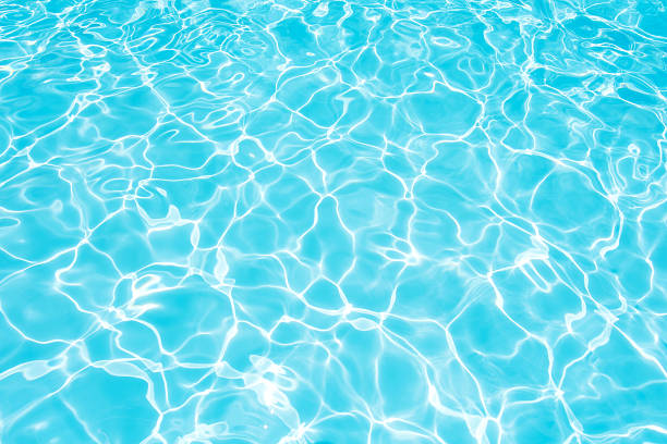 istock Beautiful blue water surface in swimming pool 623368376