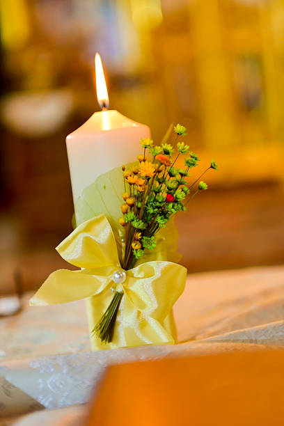 istock Candle decorated for a child orthodoxy or wedding 623370890