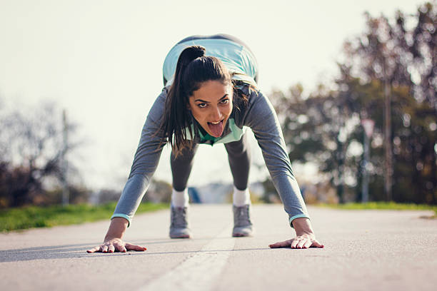 istock Young sportswoman stretching and preparing to run 623371630