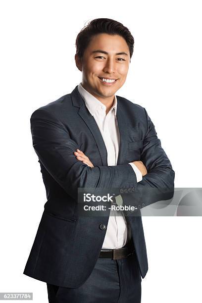 Attractive Businessman In Blue Suit Stock Photo - Download Image Now - Asian and Indian Ethnicities, Businessman, White Background