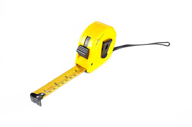 istock yellow tape measure isolated on white background 623373678