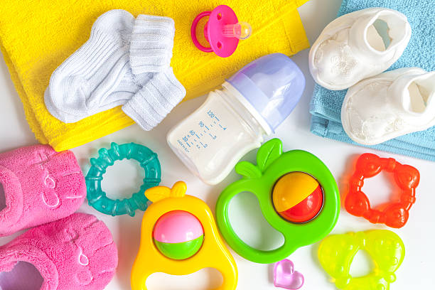 istock baby bottle with milk on white background top view 623373936