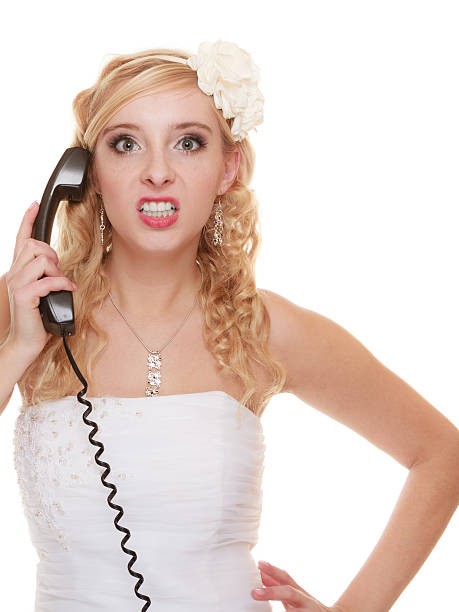 istock Wedding angry woman bride talking on phone. 623374870