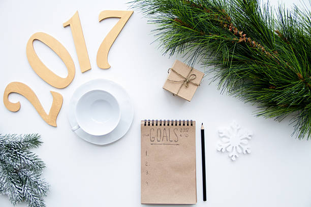 istock Plans for new year on white background top view 623375618