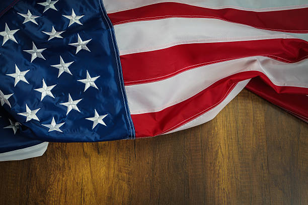 istock American flag on wood background 623376750