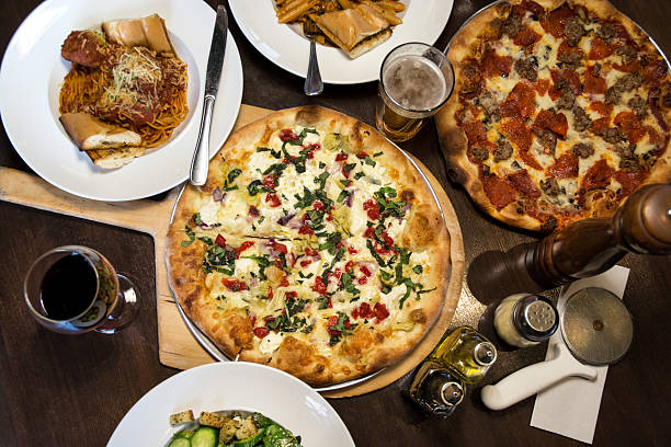 istock Gourmet Italian Food Pizza Pies On Restaurant Table 623376998