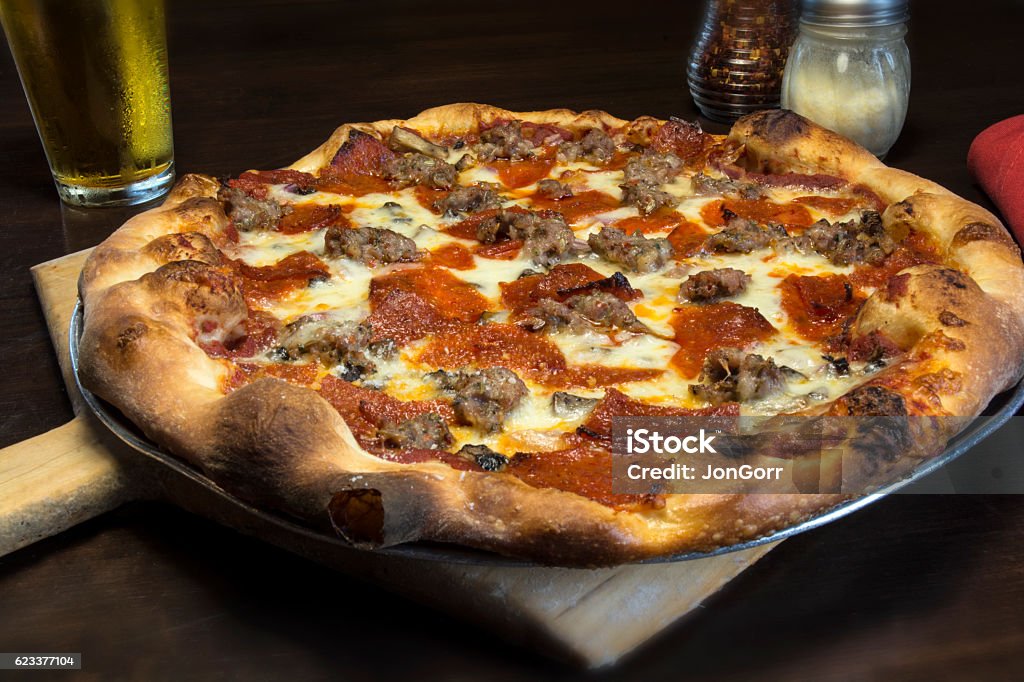 Gourmet Italian Pepperoni Pizza In Restaurant Setting Pizza Stock Photo