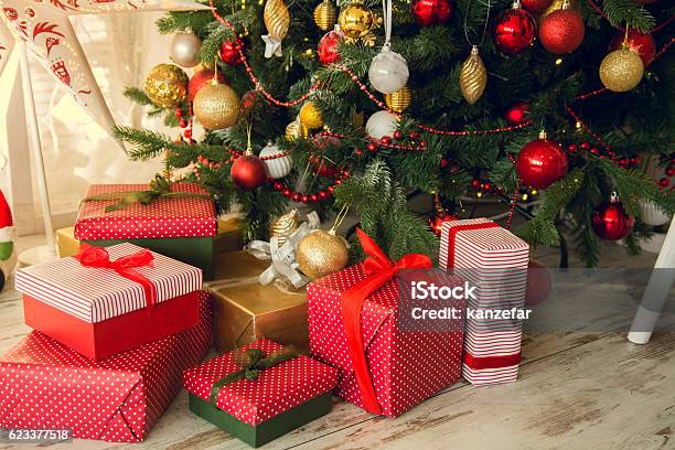 Gifts Under A Christmas Spruce Stock Photo - Download Image Now - Gift, Christmas Tree, Below