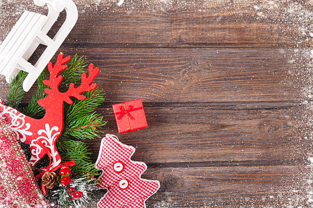 istock Christmas decoration on wooden plank. 623377552