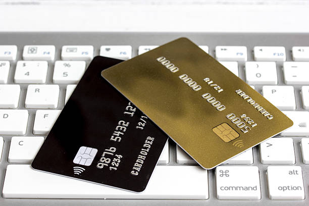 istock Credit cards on the keyboard close up 623377824