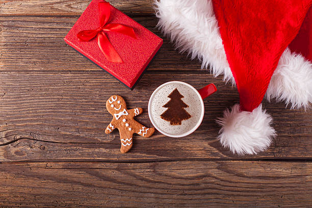 istock Christmas cappuccino and gingerbread cookies 623377850