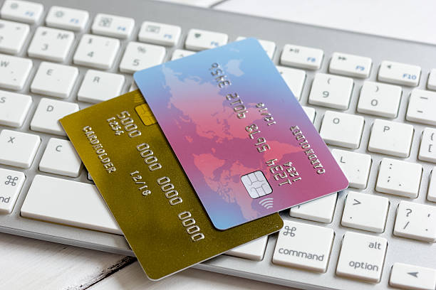 istock Credit cards on the keyboard close up 623378032