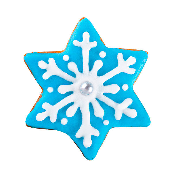 Christmas Gingerbread star cookie isolated on white. Used gingerbread cookies home-handedly made it from me. They are unique pieces and can not be found anywhere.