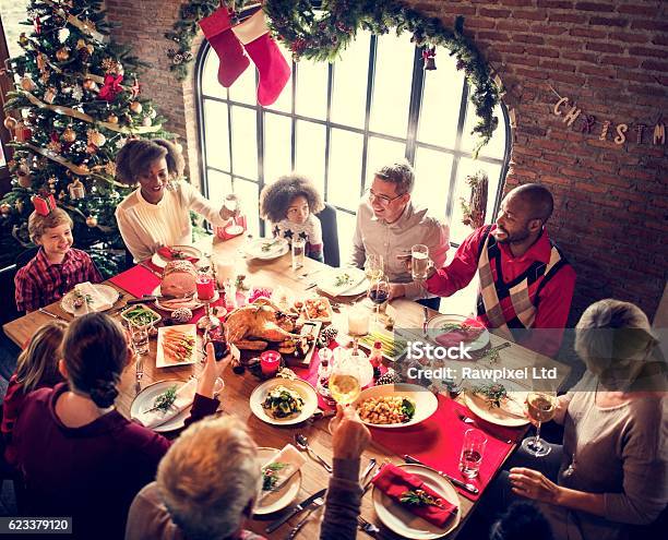 Family Together Christmas Celebration Concept Stock Photo - Download Image Now - Christmas, Family, Dinner