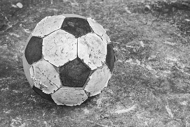 A punctured and exploded soccer ball with the Made in China legend