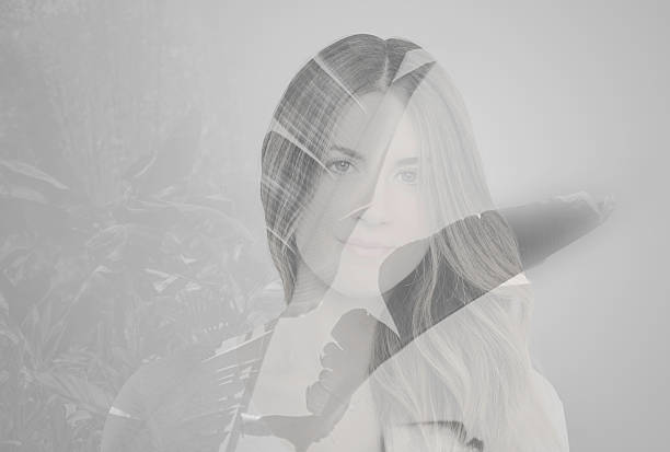 istock Double exposure pretty woman portrait 623381646
