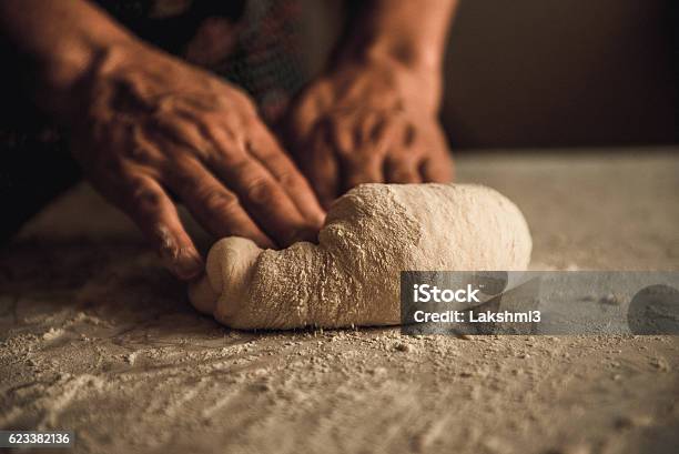 Knead The Dough By Hand Stock Photo - Download Image Now - Dough, Kneading, Bread