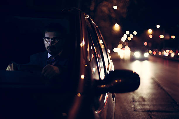 istock Young business man driving car at highway 623382938