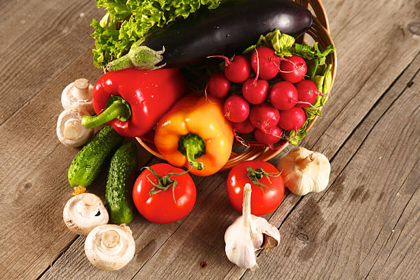 istock Fresh vegetables on a clean wooden table 623384468