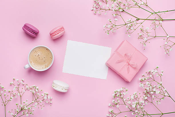 istock Greeting card concept. Coffee with macarons. Flat lay. Vintage mockup. 623421490