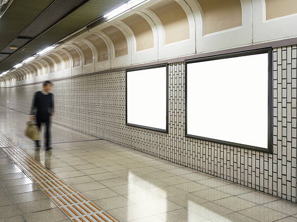 istock Blank Billboard Banner Media Light box Subway Blurred Businessman 623421654