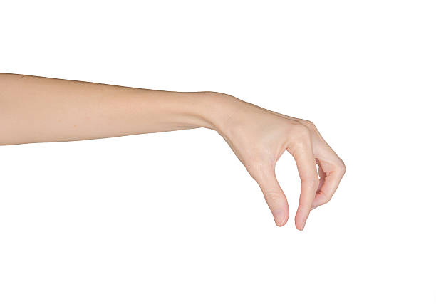 istock Closeup of female hand taking 623422686