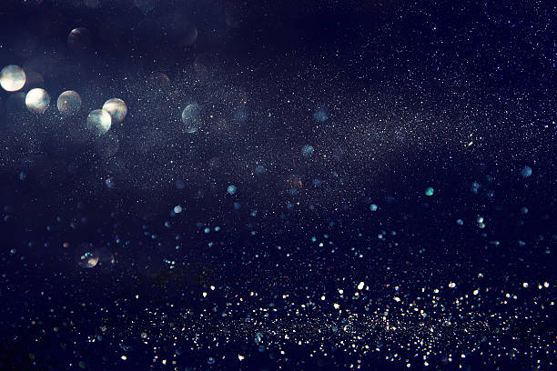 istock glitter vintage lights background. de-focused 623424574