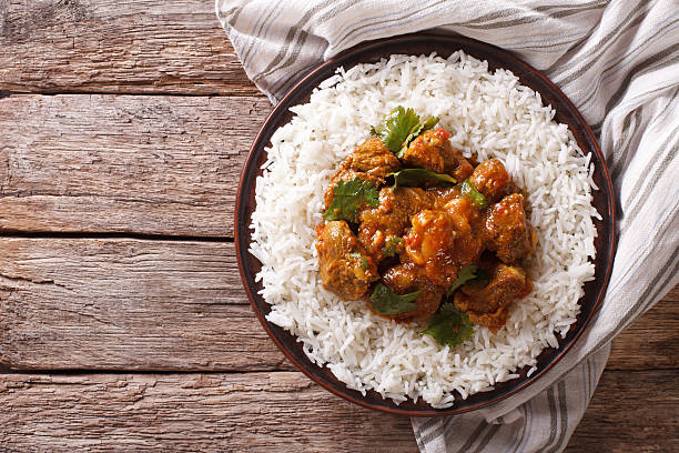 istock Indian food: Madras beef with basmati rice. Horizontal top view 623426322